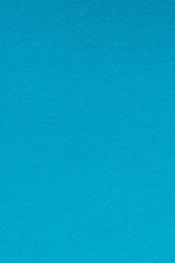 colored paper as fashion texture background in bright blue tone