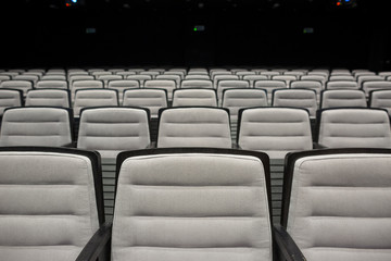 Obraz premium Empty grey seats in theatre or conference