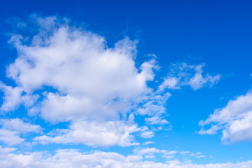 Sunshine clouds sky during morning background.  Blue,white pastel heaven,soft focus lens flare sunlight