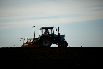 work in the field of the tractor