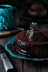 Chocolate cake on vintage wooden table
