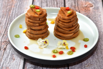 stack of pancakes with maple syrup