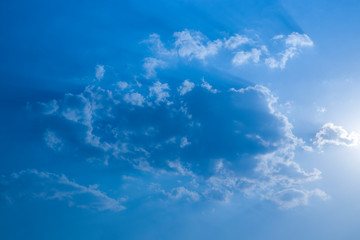 Blue sky with clouds, fluffy white cloud on air clear blue sky weather background texture.