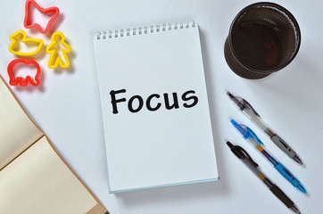Focus text on notepad with office accessories. Business motivation, inspiration concepts