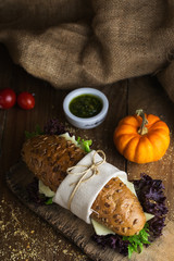 Vegetable sandwich on rustic wooden table