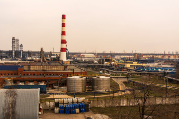 Large industrial area with factory buildings and pipes