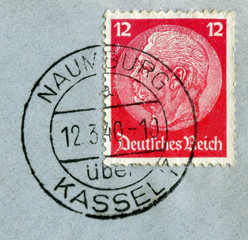 Naumburg, Kassel, Germany - March 12 1940: German historical stamp: Paul von Hindenburg on a blue postal envelope with  black ink cancellation, Germany, the Third Reich