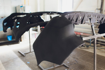 Car bumper ready to paint at the body shop.