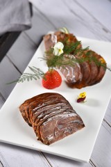 grilled beef steak with sauce and vegetables