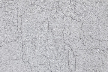 Wet cracks in the cement surface