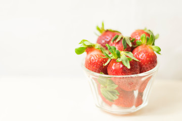 fresh strawberries in a glass bowl