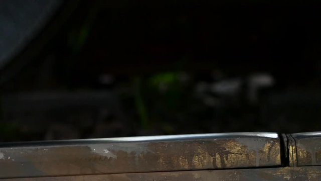 Train rides on rails, macro. Slow motion