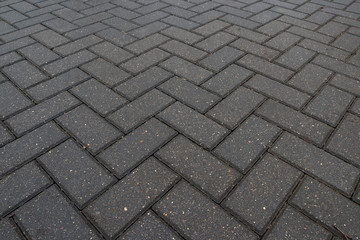 Texture of road tiles with herringbone pattern