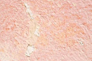Old colorful flaking whitewashed wall