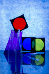 Abstract still life with transparent objects on blue background