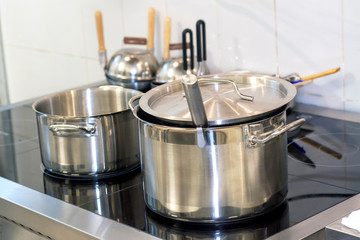 Cooking pots and appliances in the professional kitchen of the restaurant