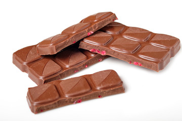 chocolate with raspberries on white background