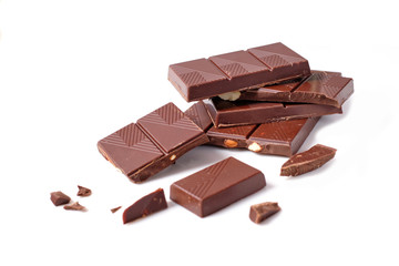 Chocolate pieces with almonds on white background