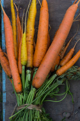 Bunch of fresh organic carrots at market.