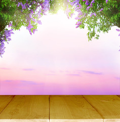 Naklejka na ściany i meble Spring background with wooden table