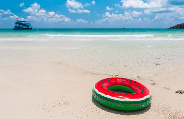 Fruit rubber life ring on the beach.