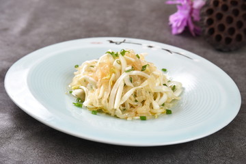 pasta with pesto sauce and basil