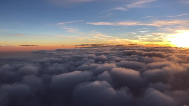 flying in the sky during beautiful sunset and thick clouds, sunset overcloud