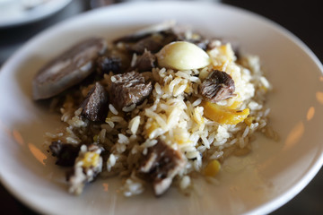 Plate of pilaf with lamb