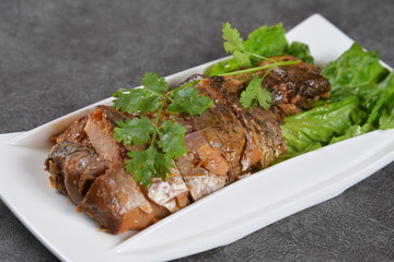 grilled beef steak with vegetables on white plate