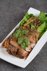 grilled beef steak with vegetables on white plate