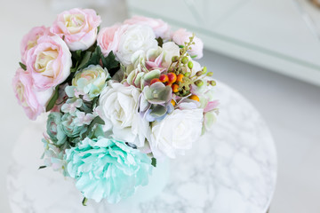 bouquet in the bedroom. bouquet of delicate flowers