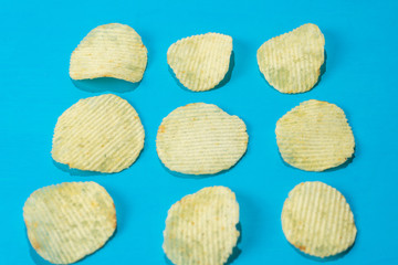 Ridged chips on colorful background