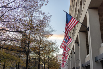 Washington, DC, USA December 2018: American flags fly outside of the J Edgar Hoover Building in Washington