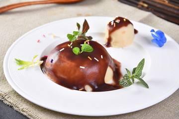 chocolate cake with ice cream and strawberries