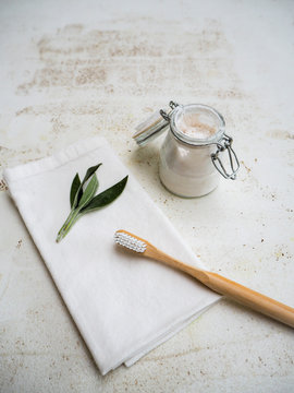 DIY homemade vegan toothpaste in a small glass jar following a plastic free, zero waste lifestyle