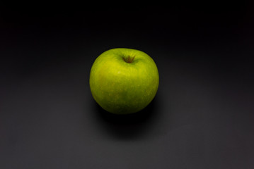 apples on black background