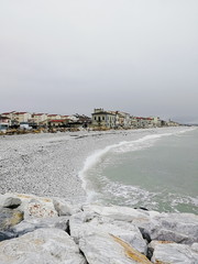 Marina di Pisa, Italy. Region Toscana. View on the city, beach and sea. Ligurian sea.