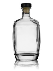 Empty glass bottle with a thick bottom closed by a cover with reflection. Isolated on a white background