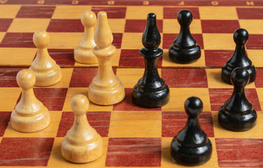 Chess set on the chess board. 