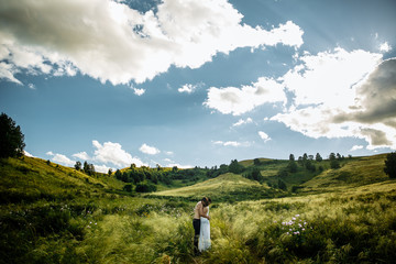 Naklejka premium Love Couple in love romantic road summer field happy. Russia. lake aslykul