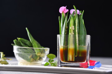 still life with flowers and olive oil