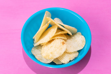 Ridged chips on colorful background