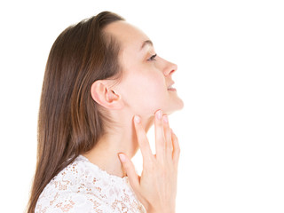 Gorgeous profile of young beauty woman with finger under chin thinking and closed eyes in copyspace over white studio background