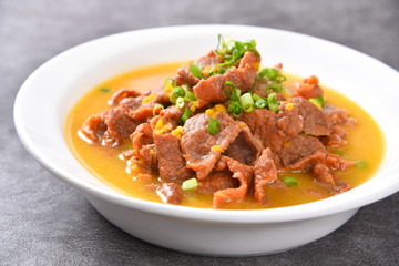 spicy noodle soup with meat and vegetables