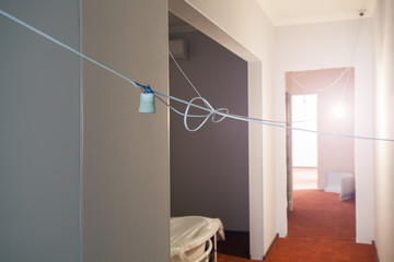 Working process of installing plasterboard or drywall for making gypsum walls in apartment is under...