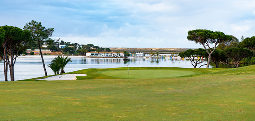 Sand water and green