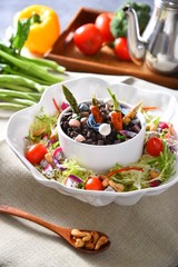 fresh salad with feta cheese and olives