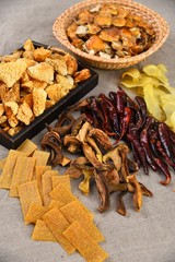 Fototapeta premium spices and herbs on wooden table
