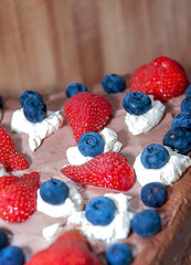 Chocolate cake decorated with fruits