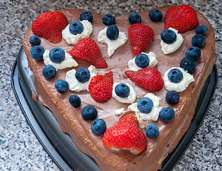 Chocolate cake decorated with fruits